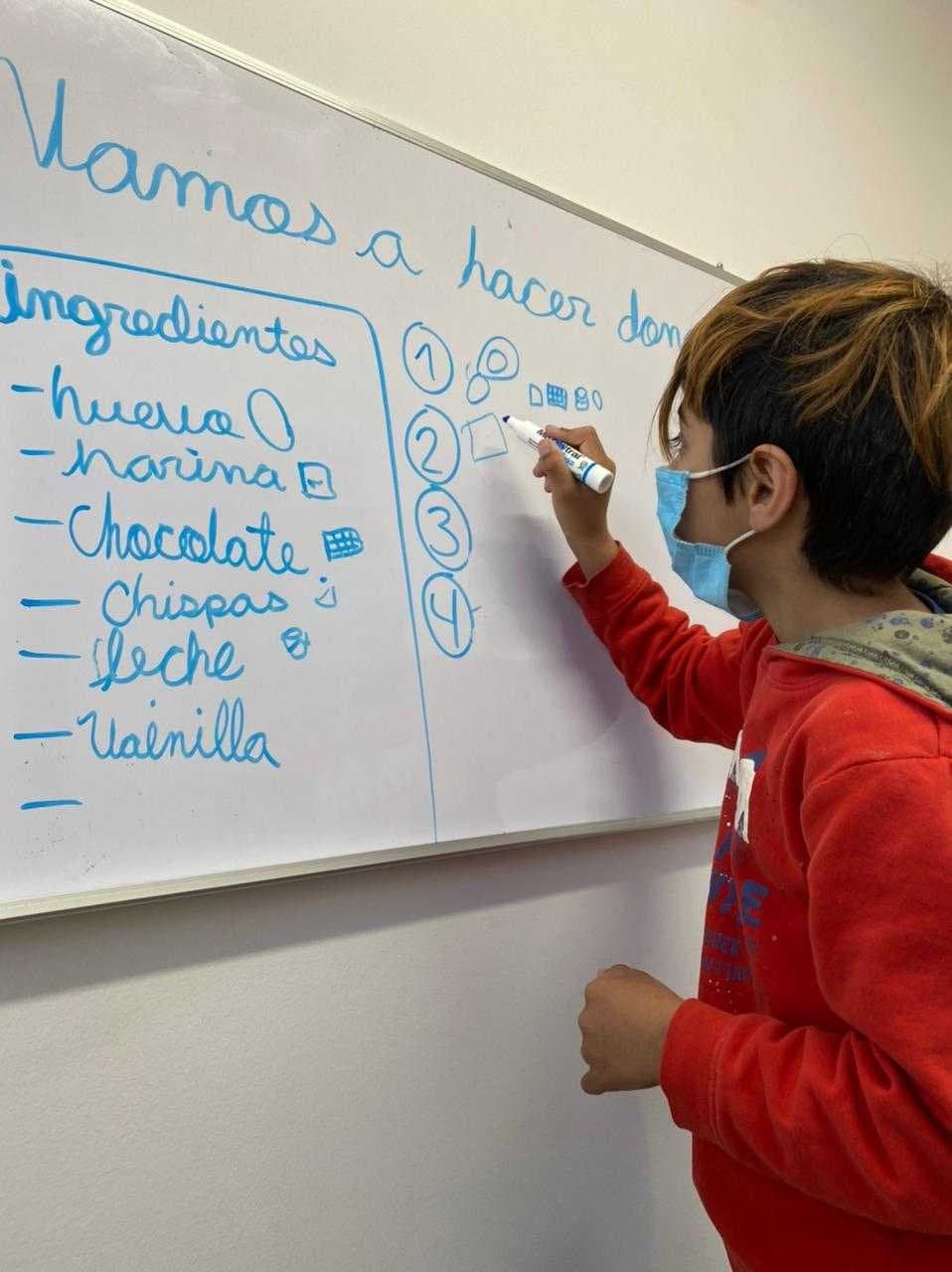 Receta en el pizarrón del taller